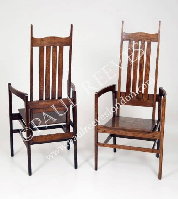  A pair of oak armchairs by C.F.A.Voysey-0 
