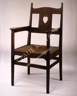 An oak armchair by C.F.A.Voysey-0