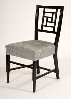 An ebonised side chair -628
