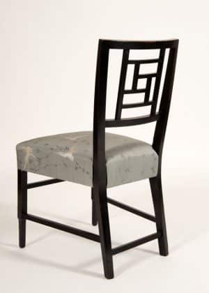 An ebonised side chair -627