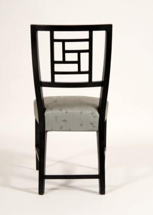 An ebonised side chair -631
