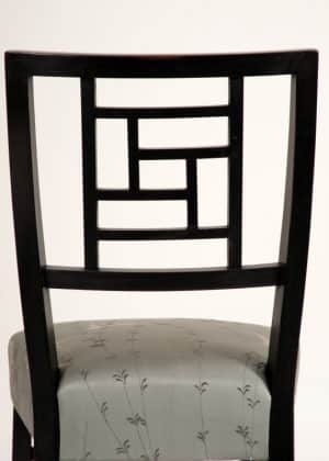 An ebonised side chair -630