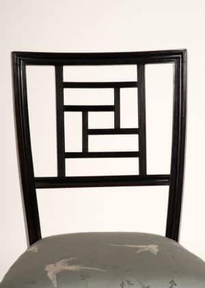 An ebonised side chair -629