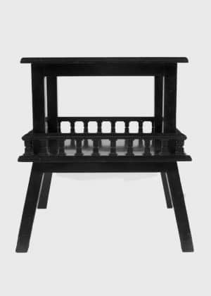 An ebonised table-0