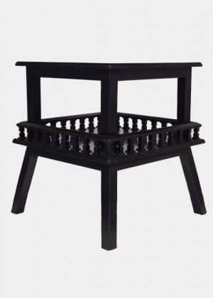 An ebonised table-688