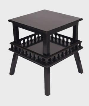 An ebonised table-690