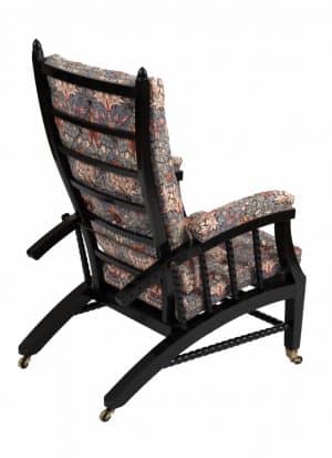 A Morris & Co. ebonised reclining chair -1410