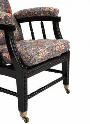 A Morris & Co. ebonised reclining chair -1409