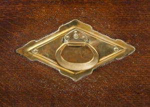 A carved oak side board -1715