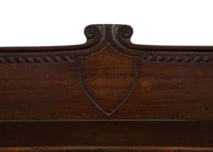 A carved oak side board -1716