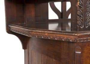 A carved oak side board -1719