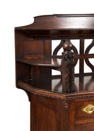 A carved oak side board -1722