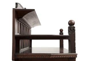 A carved oak side board -1723