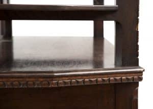A carved oak side board -1724