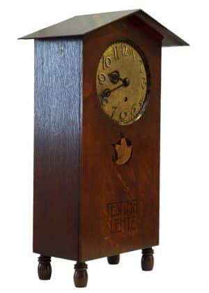 A rare inlaid oak mantle clock -1813