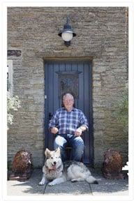 Paul Reeves at his home with his dog