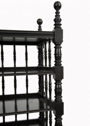 An ebonised whatnot