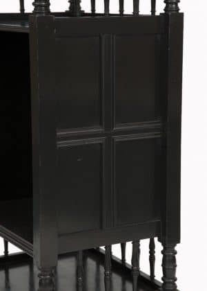 An ebonised whatnot