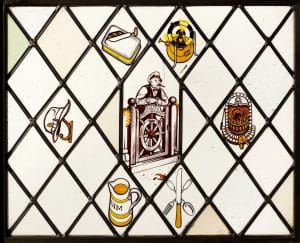 A painted glass panel of 'Uncle Mac' from Paul Reeves London