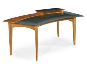 A Venini glass and beech wood desk with pivoting open shelf.