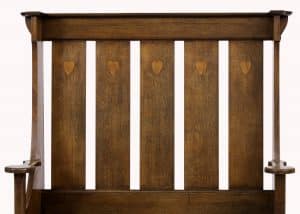 A rare inlaid oak settle
