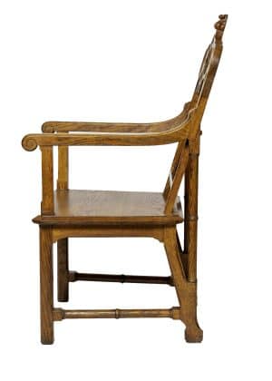 A Gothic Revival oak armchair