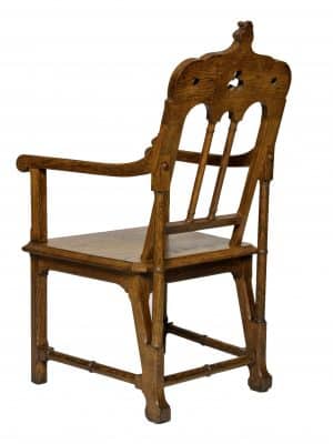 A Gothic Revival oak armchair