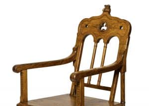 A Gothic Revival oak armchair