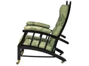 A classic Morris & Co. reclining chair by Paul Reeves London in green
