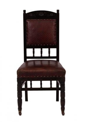 An ebonised side chair