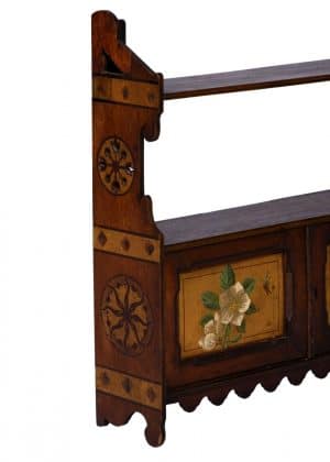 An Art Furniture painted hanging cabinet, probably Henry Capel after Alfred Waterhouse.