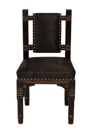 A Pair of ebonised incised and gilded chairs